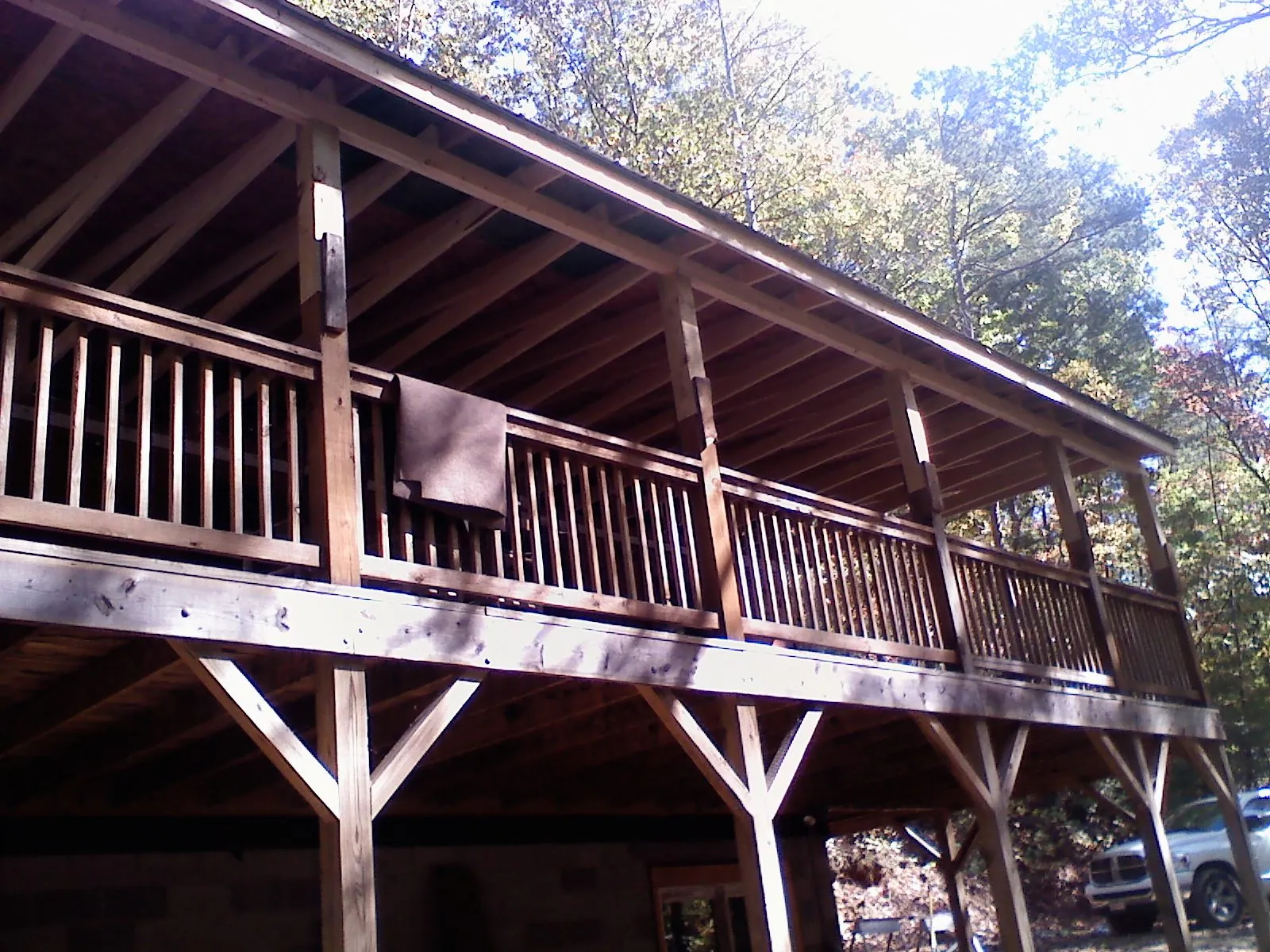 Timber framing under a new elevated porch and deck — Roof Leak Repair in East Freetown by Roofing Brothers